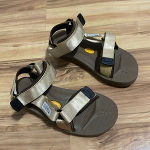 Suicoke beige sandals.